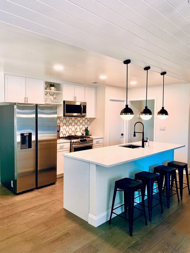 Photo - **FULLY FURNISHED 4 BR, 2BA HOME. CLOSE TO...
