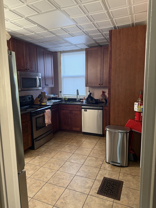 Kitchen, with full size fridge - 2118 Hudson Ave