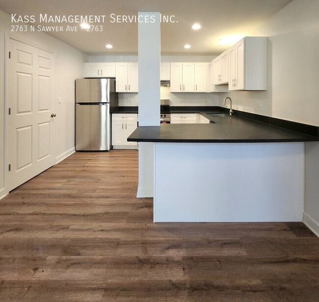 Photo - 2763 N Sawyer Ave Apartamento Unidad 2763