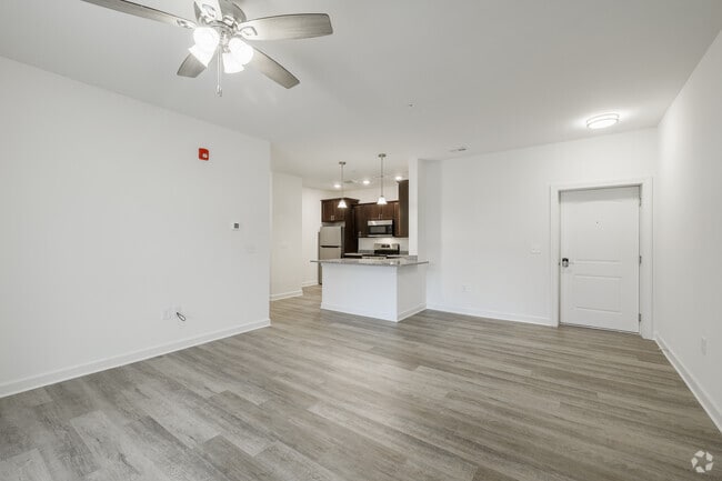 3BR, 2BA - 1,372SF - Living Room and Kitchen