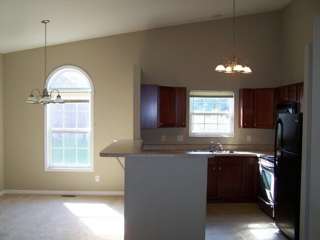Photo - 2 bath, 2 car garage townhouse w/ bonus room and fenced yard
