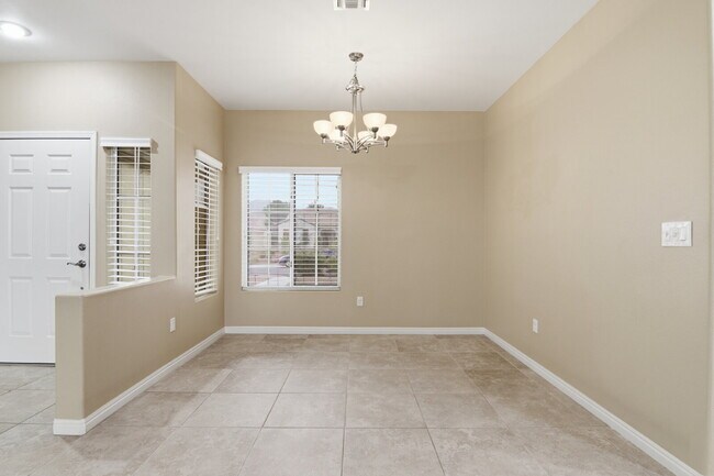 Photo - Comfortable single-story living! This inviting 3-bed, 2-bath home offering 1,756 sq ft with fully...