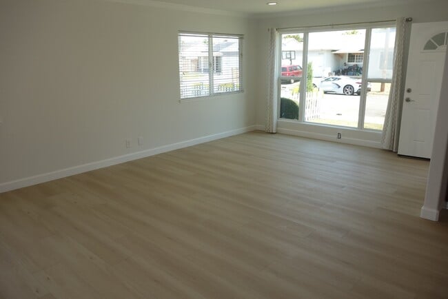 Photo - Bright 3BR Home with Central AC, Attached ...