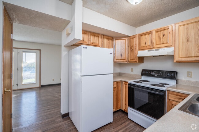 3 habitaciones, 2 baños - 1100 pies cuadrados - Cocina - Timber Ridge Townhomes