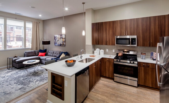 Kitchen and living area - Avalon Maplewood Apartments