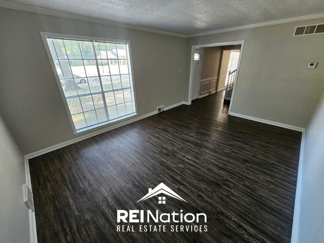 Photo - HUGE 4BR/2.5BA MEMPHIS HOME! | Vinyl Plank & Brick Fireplace | Fenced Yard!