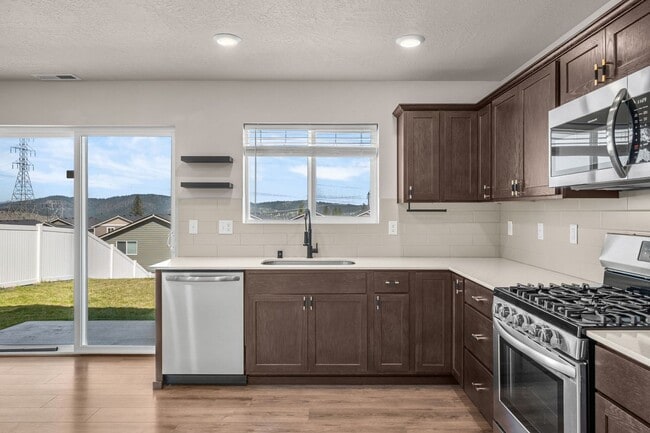 Building Photo - MOVE-IN SPECIAL: Half Off 2nd Month! Like-New 2022 4BR/2.5BA — NW Spokane