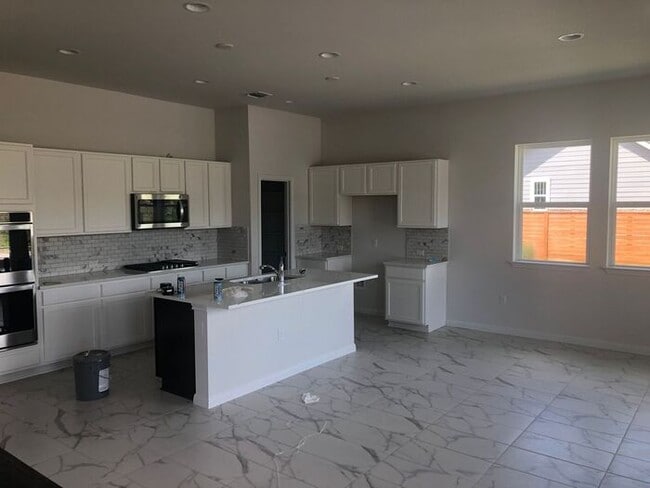 Photo - Elegant 4 BR 3.5 BA and 1 Office/Bedroom Convertible Home with Modern Amenities