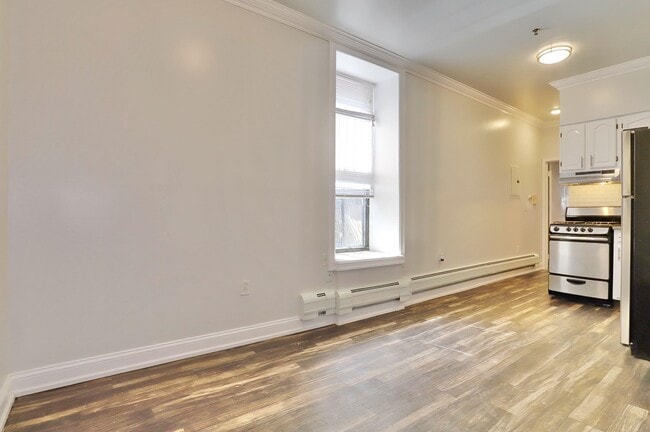 Building Photo - 6311 Dewey Ave Unit 2