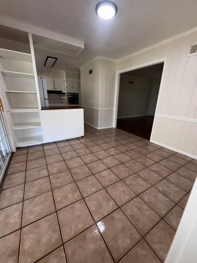 Photo - Charming 3 bedroom, 2 bathroom home featuring a fenced-in backyard and enclosed back porch. Fresh...