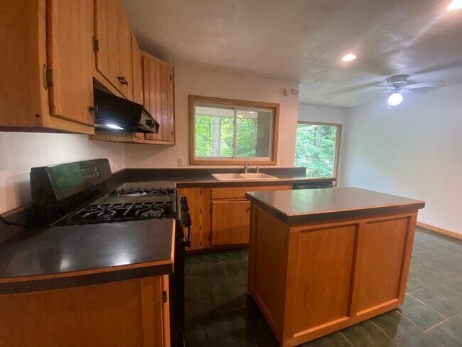 Secluded 4 bedrooms 3 baths with 2 car garage and fenced in yard in the town of Rutland for rent!