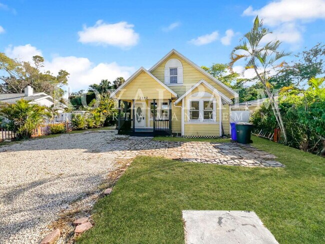 Photo - Deck the halls or the French doors, because this charming century-old single family home is avail...