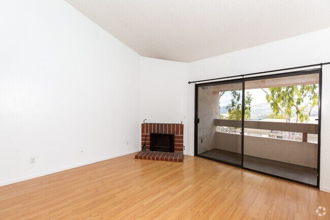 Building Photo - !!! CHARMING 2/2 CONDO WITH 2 CAR GARAGE I... Unit 53