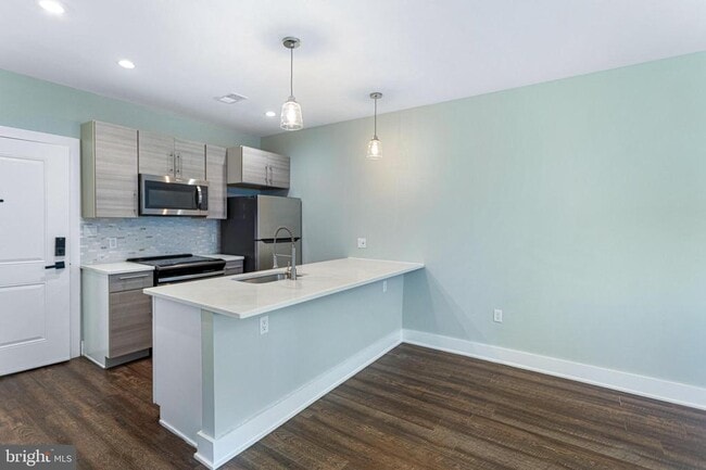 Building Photo - 1219 K St NE Unit 203