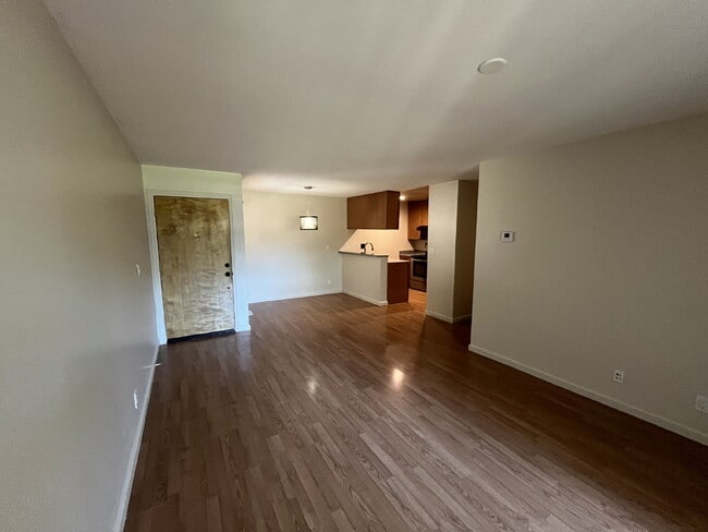 Downstairs 2 bedroom unit with parking and a patio