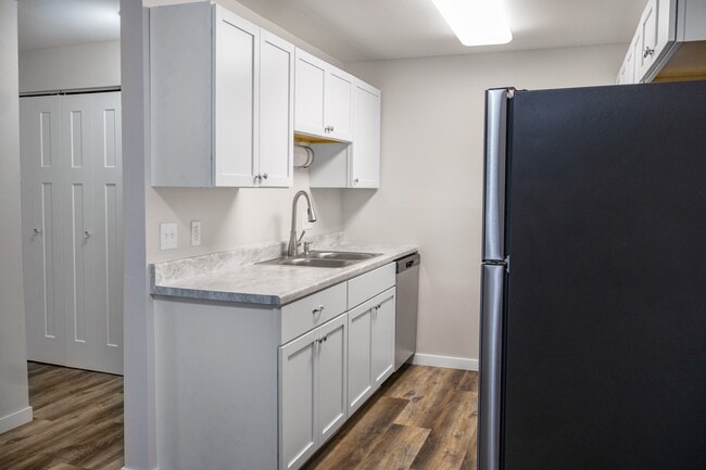 Step into modern elegance at The Gallery with this sleek kitchen featuring high-end finishes, ample storage, and stainless steel appliances. Perfect for culinary creativity. Schedule your tour today and see what awaits!