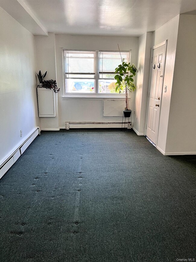 Building Photo - 93-22 243rd St Unit 1