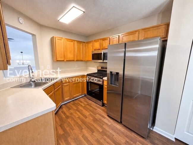 Photo - 4 Bed/3 Bath Home with Fenced Yard & Garage / Available Now!