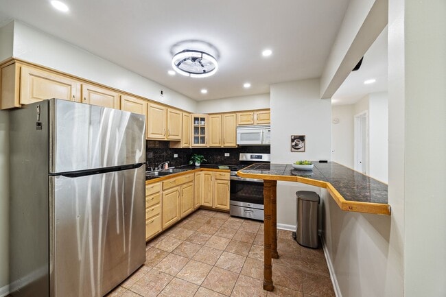 Building Photo - 929 S Oak Park Ave Unit 3NW