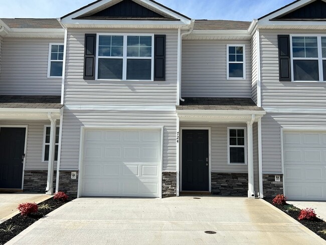 Photo - Beautiful New Construction 3 bedroom 2.5 Condo   with garage- Water, trash & sewer incuded!