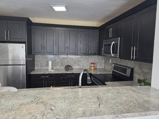 Photo - 5775 W 20th Ave Unit 412