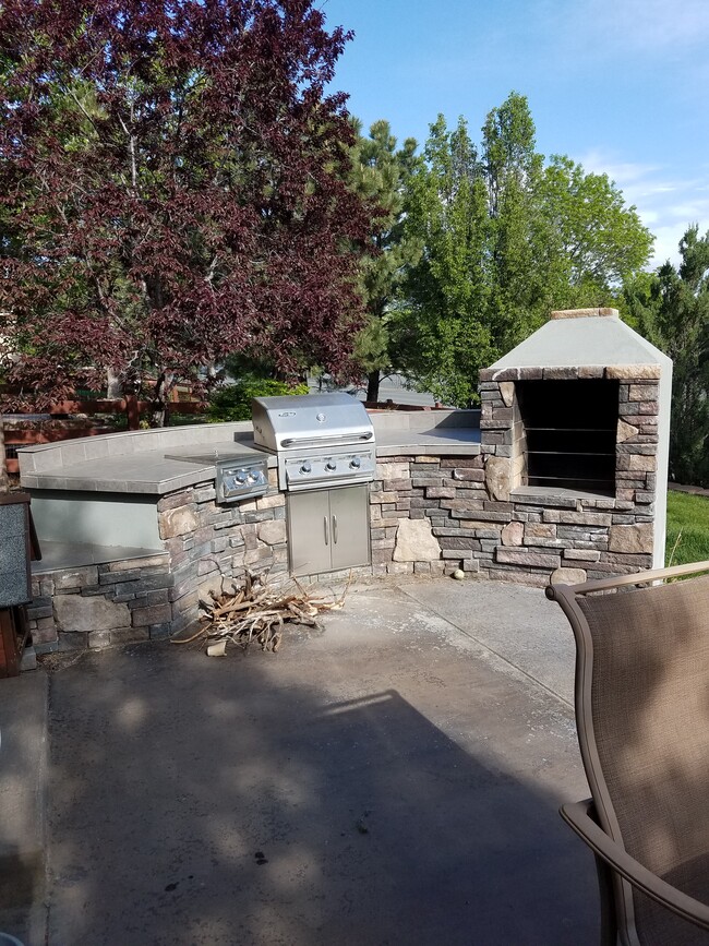 Backyard Patio and BBQ area - 16909 W 63rd Ln