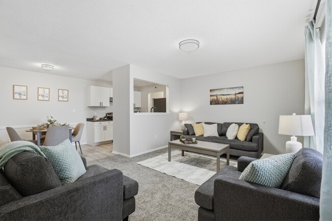 Bright, open-concept living room with space to relax or entertain.