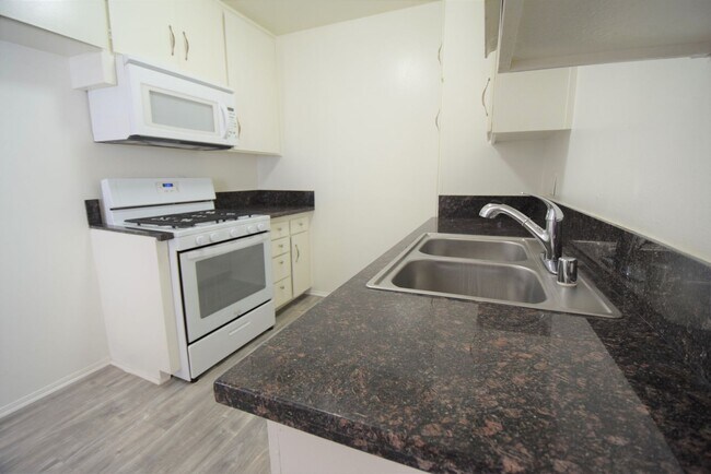 6954 Woodman Avenue - 6954 Woodman Avenue Apartments