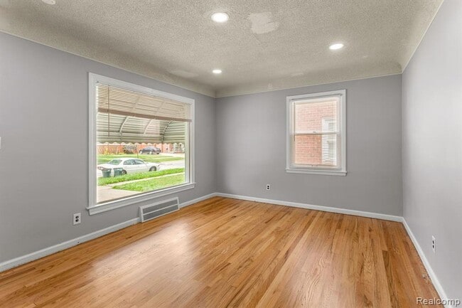 Photo - Cozy & Modern: 2-Bed Brick Home with Garage & Finished Basement