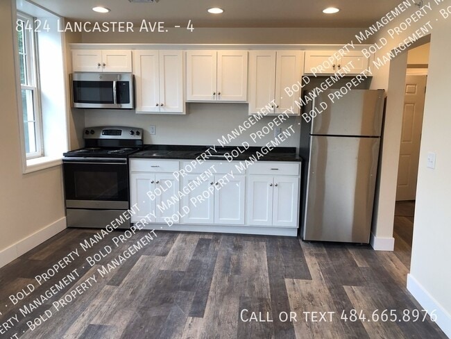 Building Photo - 8424 Lancaster Ave Unit 4