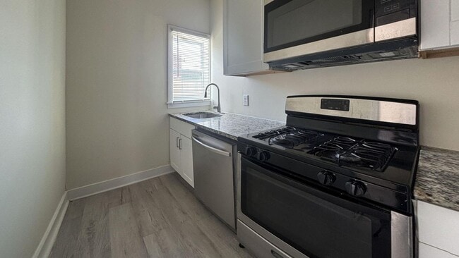 Photo - Updated 3BR with Parking & New Kitchen on Quiet Residential Block