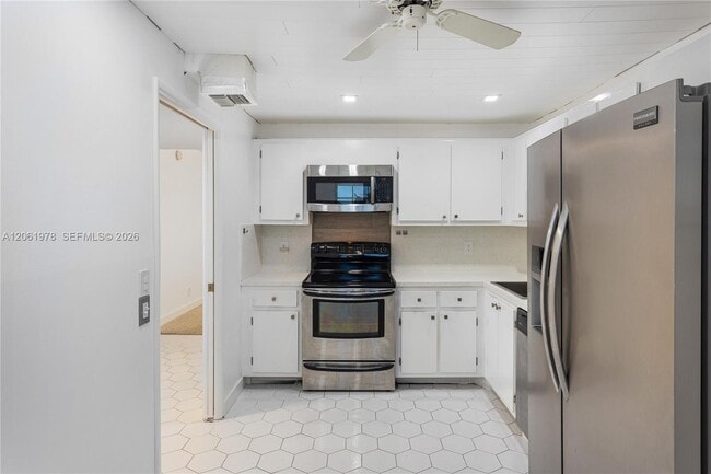 Building Photo - 4030 W Palm Aire Dr Unit 407