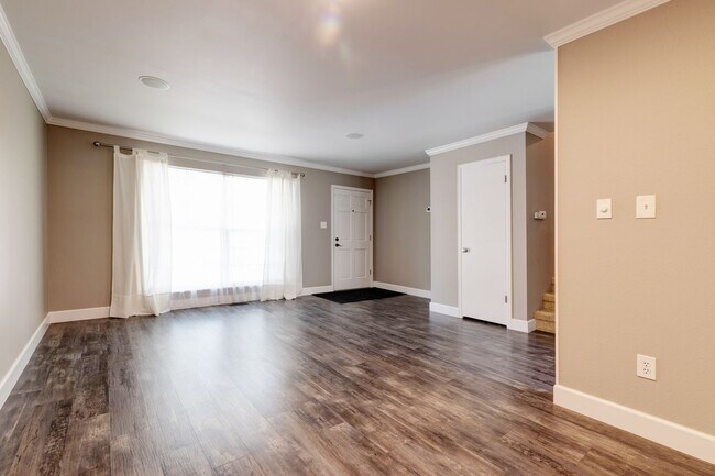 Photo - Spacious 4-Bedroom Home with Private Backyard and Solar Savings – Prime Location!