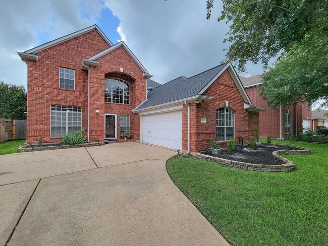 Building Photo - Beautiful brick 4 bedroom, 2.5 bath, 2 story home in Memorial Springs. New roof, freshly painted ...