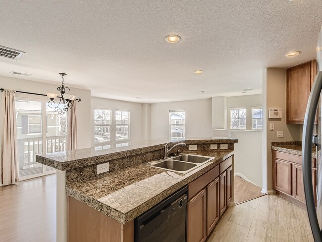 Photo - Evolve Real Estate: Spacious 2 Bed 2 Bath Condo with Attached Garage in Parker!