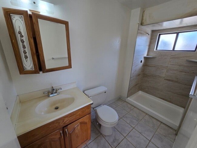 Photo - Spacious 4 Bedroom Home with 2-Car Garage & Large Living Areas
