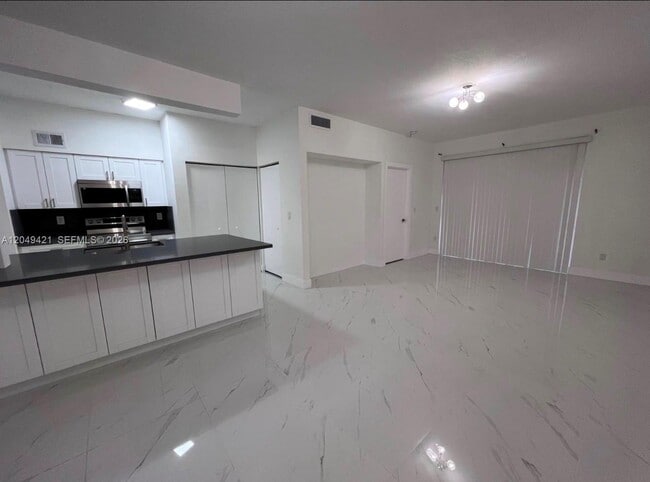 Building Photo - 18344 NW 68th Ave Unit F