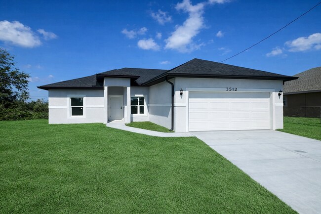 Photo - JUST BUILT! 4 Bed / 2 Bath Home with 2 Car Garage- In Desirable SW Lehigh Acres Location