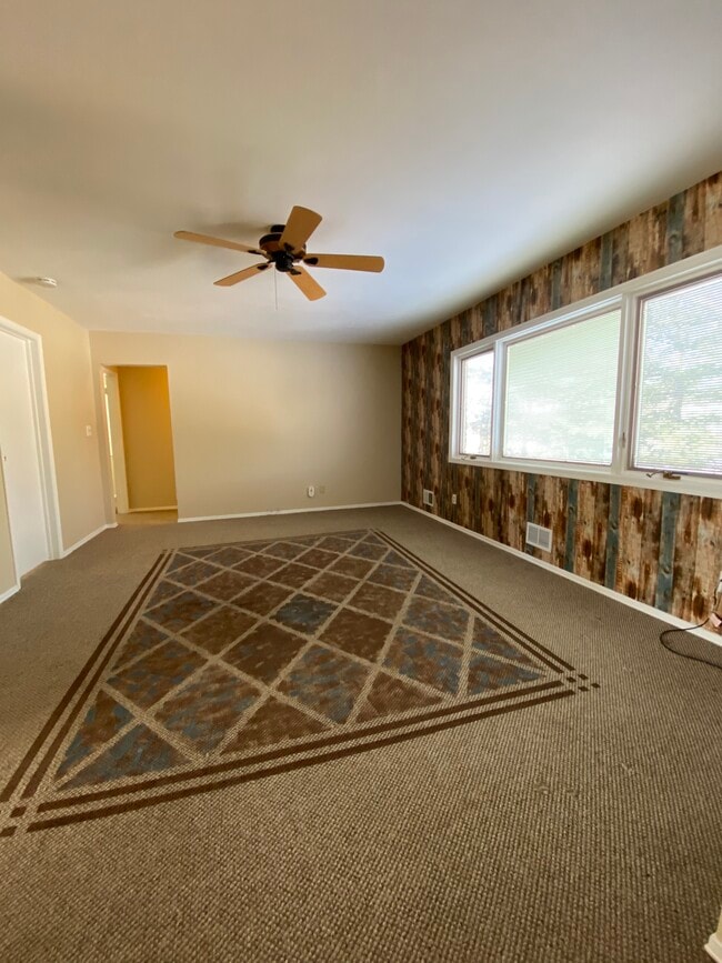 Carpet will be replaced with hardwood floor and wall paper will be removed. - 57 Morgan Ln Unit 4b