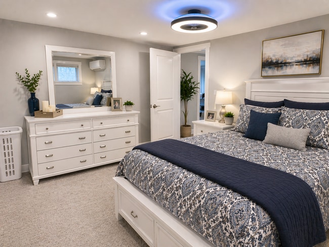 Quiet bedroom with split-unit AC/heat and modern lighting - 1925 Ryder St Unit L1