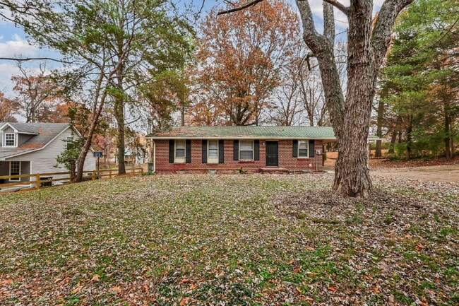 Photo - Cozy 3BR Home with Spacious Yard & XL Carport!