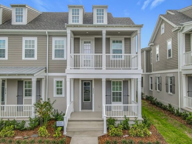 Building Photo - New Luxury Townhome in Celebration, FL Corner unit. All porcelain tiled floors.