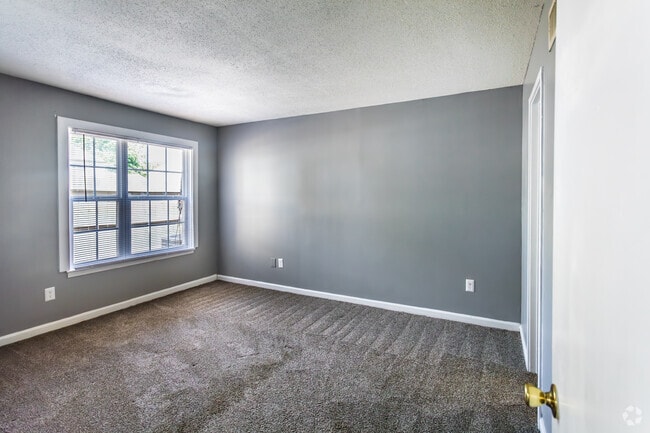 2BR, 1.5BA - 1,010SF - Primary Bedroom