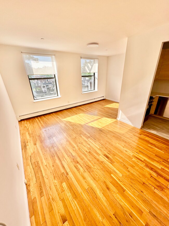 Living Room / Dining Area - 2322 Adam Clayton Powell Jr Blvd Unit 5D