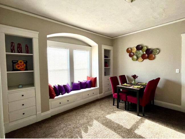 Family Room w/ Built-In Shelves and Storage - 603 E 109th St Unit 3