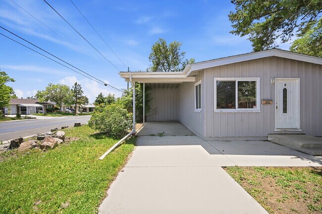 Photo - $2,640.95- 4 Bed, 2 Bath Home in Denver with Patio Space and In Unit Laundry!