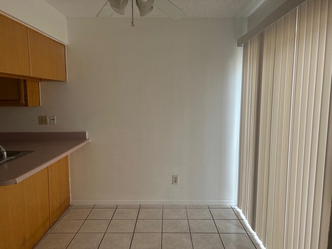 dining space with ceiling fan and outside area - 1345 Trudy Elaine Dr Unit C