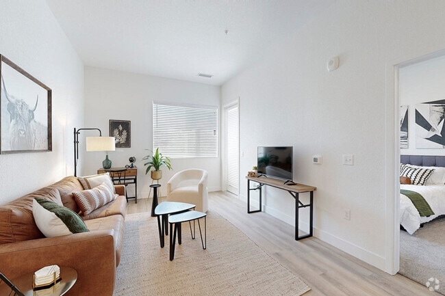 1BR, 1BA - 665SF - Living Room - Rendezvous Trail Apartments