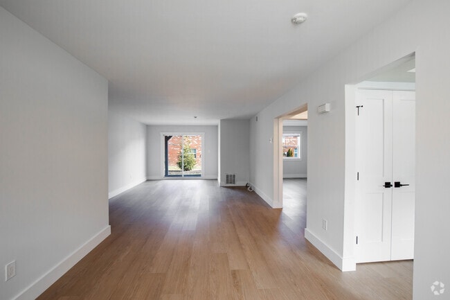 Renovated One Bedroom Living Room - Woodhull Gardens Apartments
