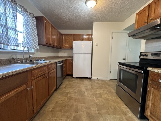 Photo - This end unit townhome offers convenience and comfort, situated close to Manassas Park.